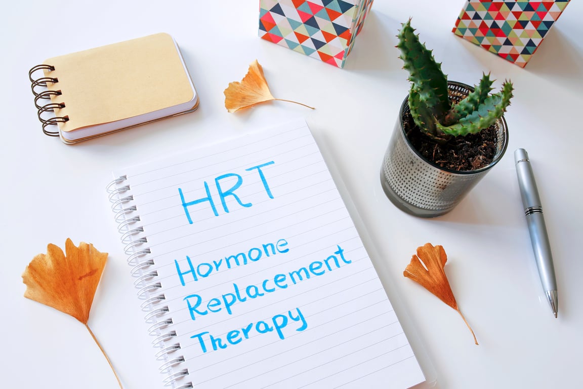 HRT Hormone Replacement Therapy written in notebook